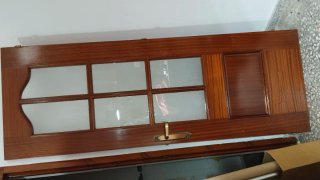 Hoja de puerta madera sapelly con cristal