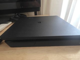 Ps4 Slim 1TB con control y 2 juegos
