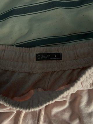 Pantalón corto chándal rosa hombre