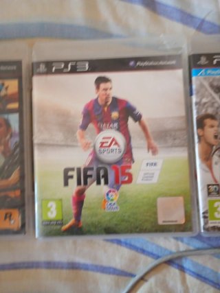 PS3 con 2 mandos y 3 juegos