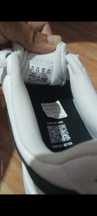 Zapatillas Puma niño blancas y negras