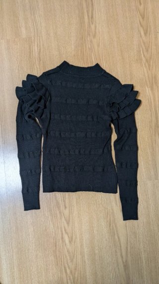 Jersey negro manga larga con botones