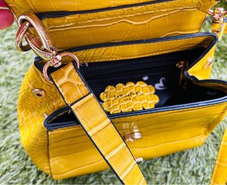 Bolso Lollipops amarillo con corazón dorado