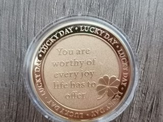 Moneda de la suerte trébol