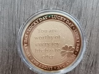 Moneda de la suerte trébol