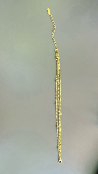 Pulsera dorada multicadena