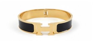 Pulsera Hermès H Negra y Dorada
