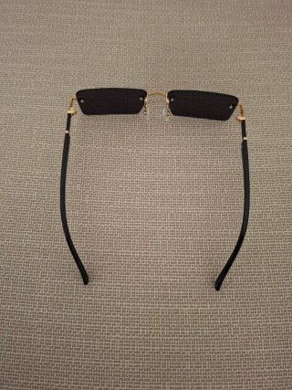 Occhiali da sole senza montatura oro nero