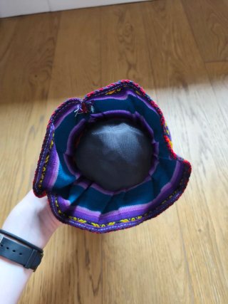 Muñeca peruana artesanal con flauta