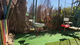 Columpio infantil con asientos
