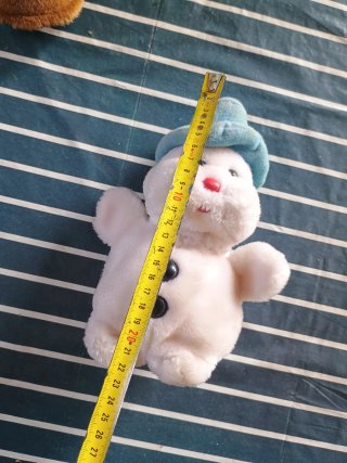 Pupazzo di neve peluche cappello blu