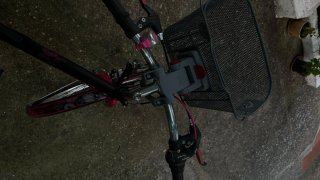 Bicicleta infantil negra y rosa
