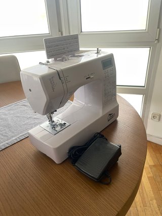 Máquina de coser Uten computarizada