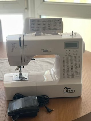 Máquina de coser Uten computarizada