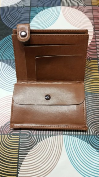 Carteras,varios modelos y un bolso o mariconera