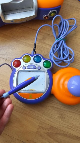 VTech V.Smile + 2 mandos + micro + 8 juegos