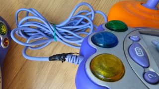 VTech V.Smile + 2 mandos + micro + 8 juegos