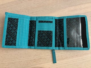 Cartera Dickies negra y turquesa