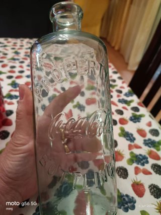 Collezione Coca-Cola: Bottiglia e Bicchieri Rossi