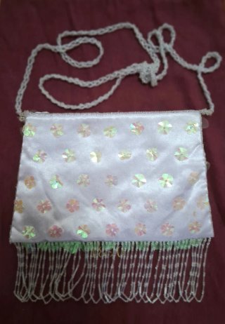 Bolso de fiesta lentejuelas y flecos