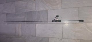 Caña de pesca slow rider carrete daiwa saltiga hl