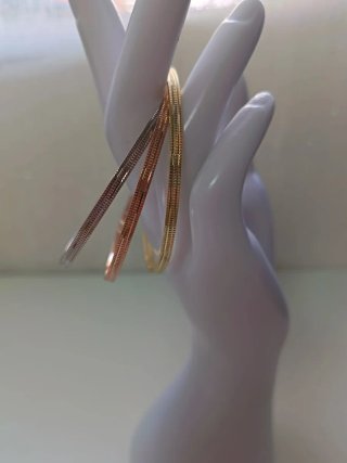 Pulsera fina dorada y plateada