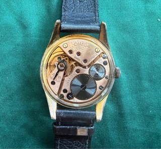 Omega de cuerda manual años 50