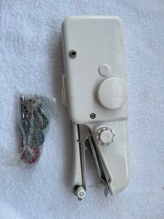 Máquina de coser portátil