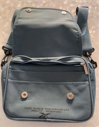 Bolsito bandolera Reebok azul/gris