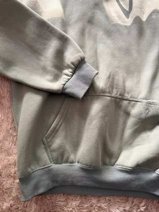 Sudadera verde con capucha