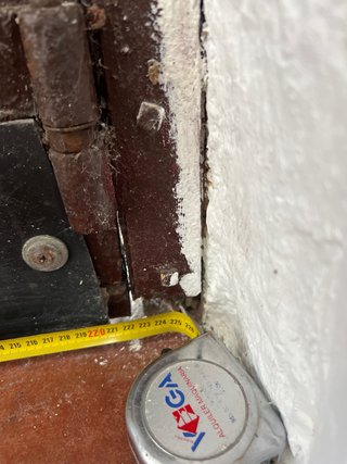 Puerta doble de madera con cristal