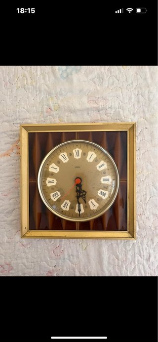 Reloj SMIT dorado y marrón