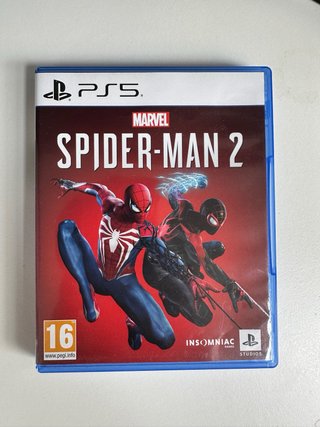 Playstation 5 Sony + 2 joysticks + 14 juegos