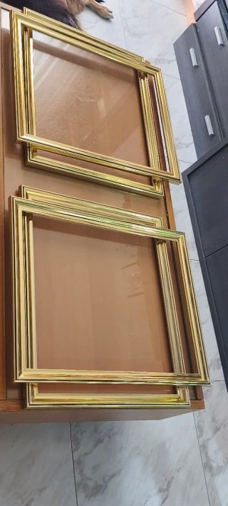Marco  dorado y madera