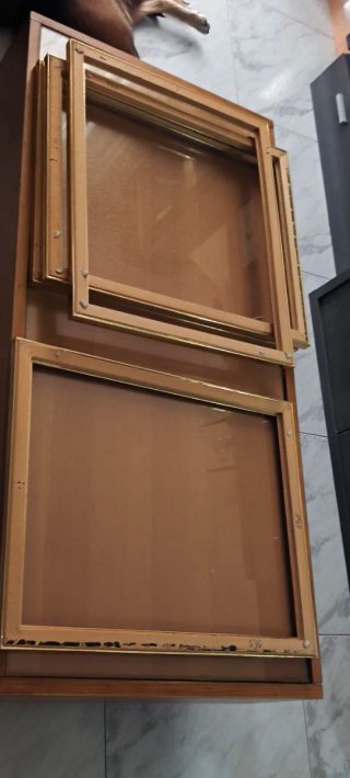 Marco  dorado y madera