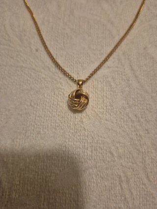 Conjunto de bisutería nudo dorado