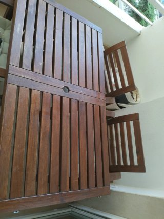 Mesa de madera extensible para terraza con 4 silla
