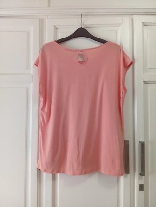 Camiseta coral de Encuentro
