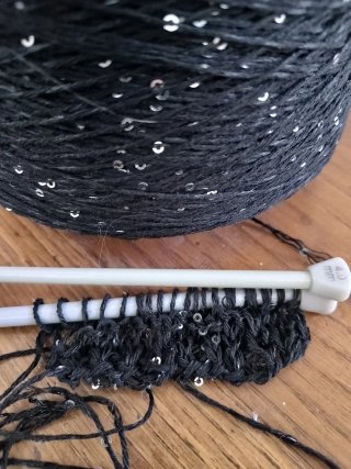 Filato nero con paillettes