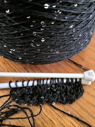 Filato nero con paillettes