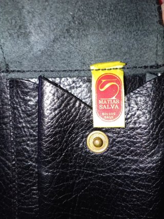 Cartera de mano piel negra