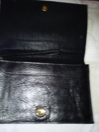 Cartera de mano piel negra