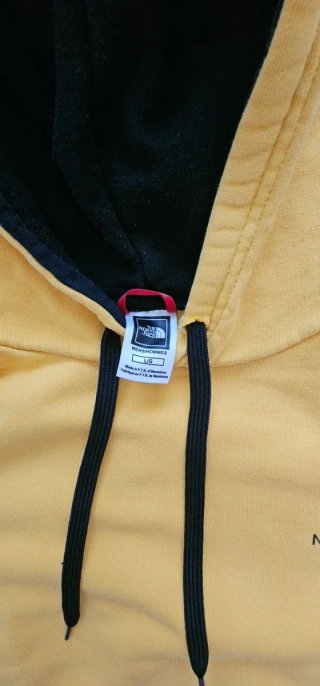 Sudadera The North Face amarilla
