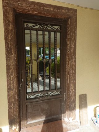Puerta de forja hierro con cristal espejo