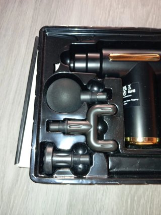 pistola de masaje