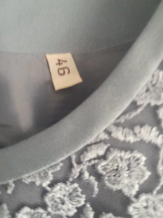 Traje azul de vestido y chaqueta