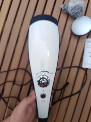 Masajeador eléctrico con cabezales