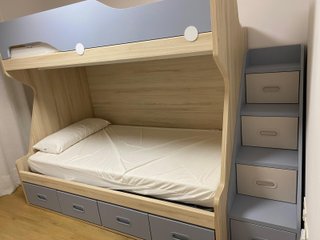 Cama litera infantil con cajones y escalera