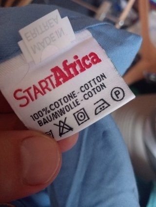Camicia scout azzurra con patch