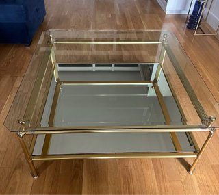 Mesa de centro cristal y metal dorado